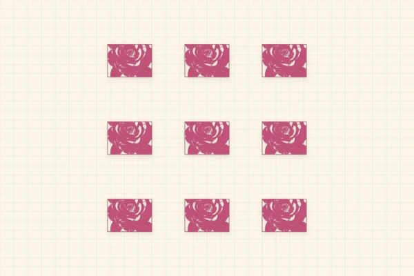 A postcard with a repeating camellia pattern